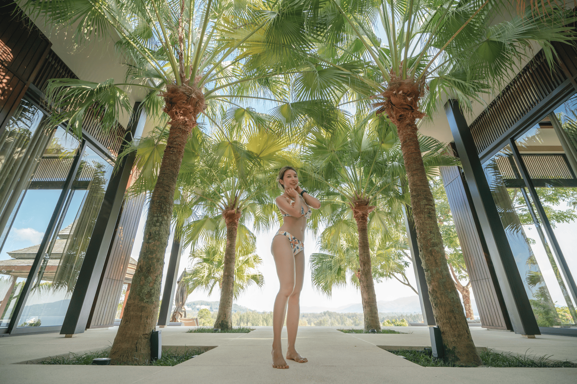 woman-bikini-walking-pool-direction-with-palms-trees-walk-from-villa-water-vacation 1